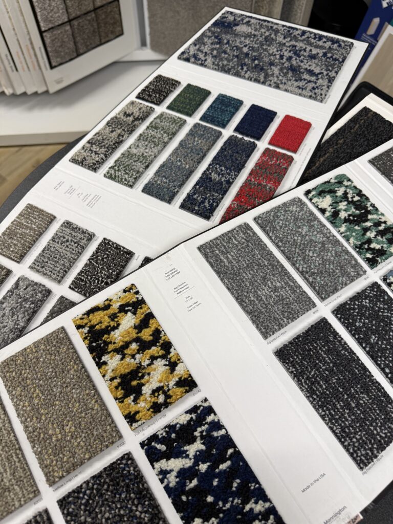 Carpet sample boards laid out for a Shop at Home visit